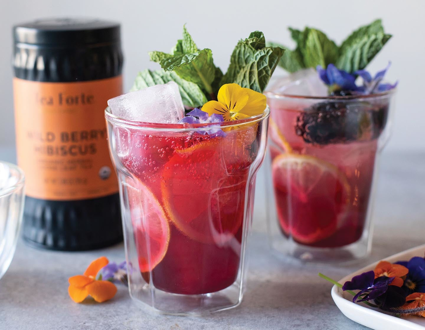 Wild Berry Hibiscus Spritzer with loose tea canister