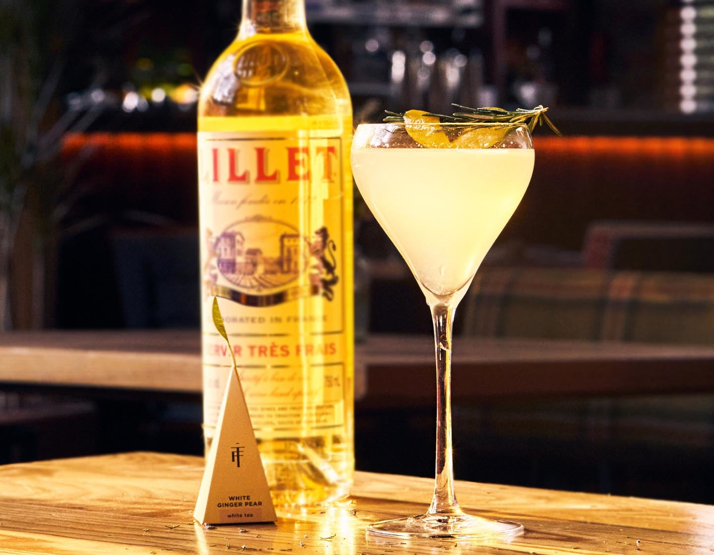 White Lillet Forté in a glass with infuser and Lillet bottle