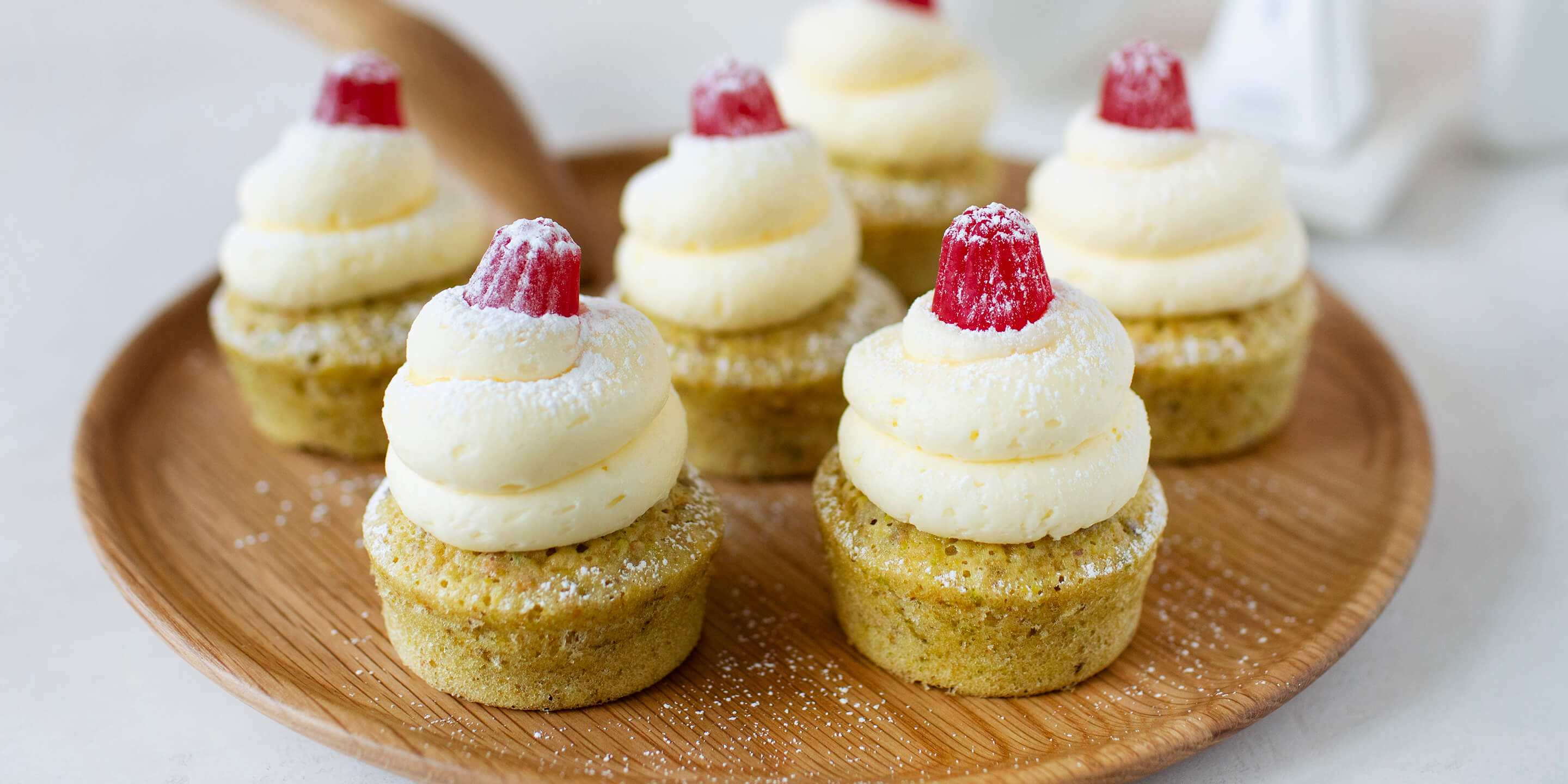 Pistachio Teacakes on a wooden tray