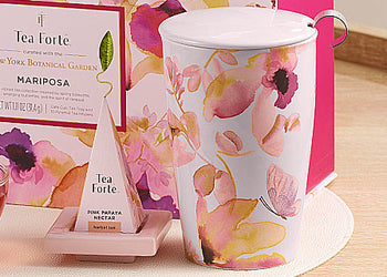 Mariposa KATI Steeping Cup with infuser on the side on a tea tray