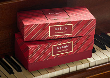 Warming Joy Presentation Boxes on piano