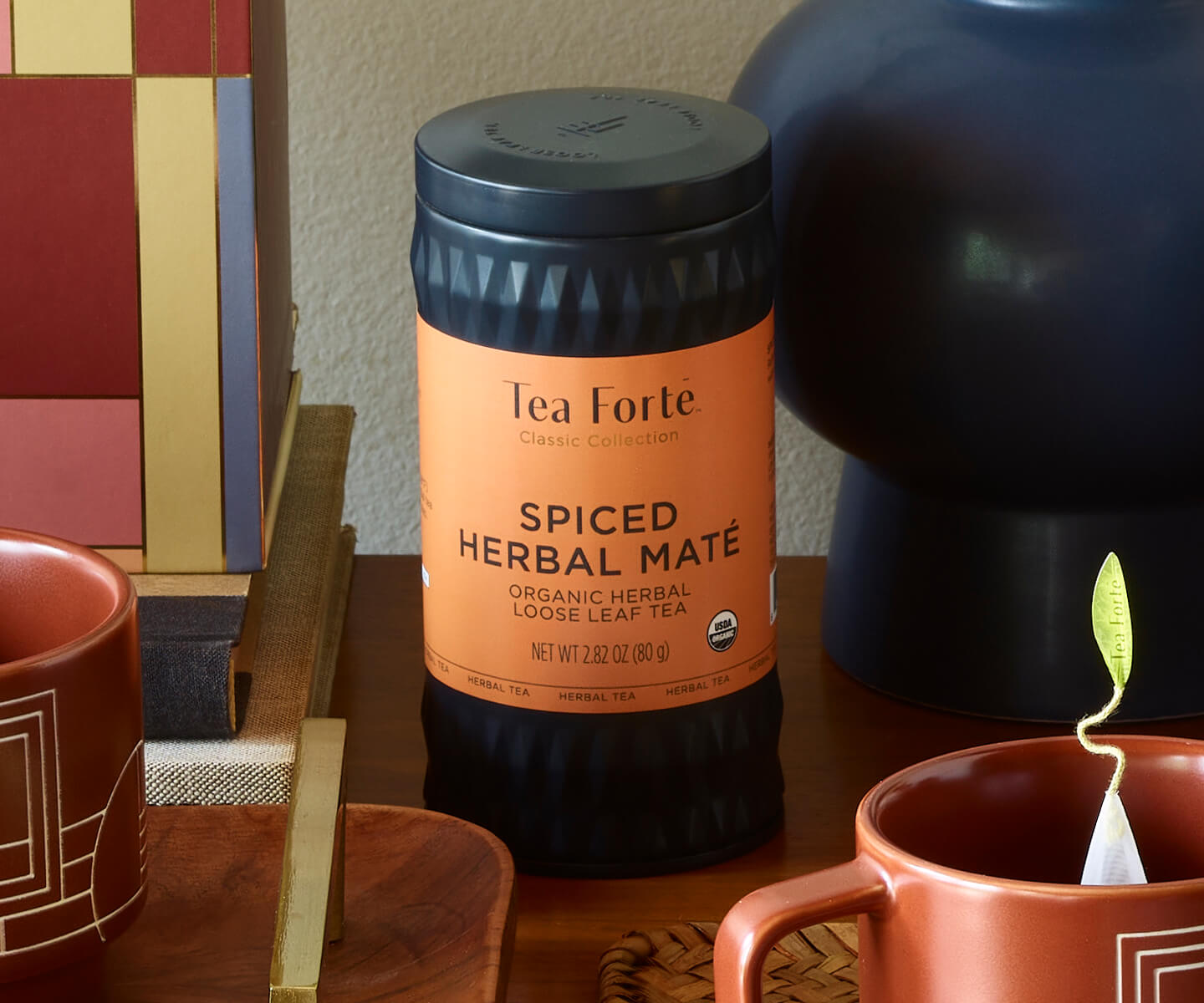 Spiced Herbal Mate Loose tea canister and teacup