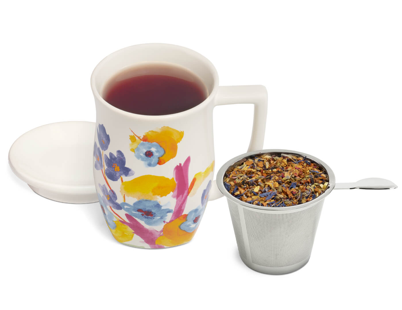 Volaré Fiore Steeping cup with brewed tea inside, and an infuser basket filled with loose tea leaves to the side