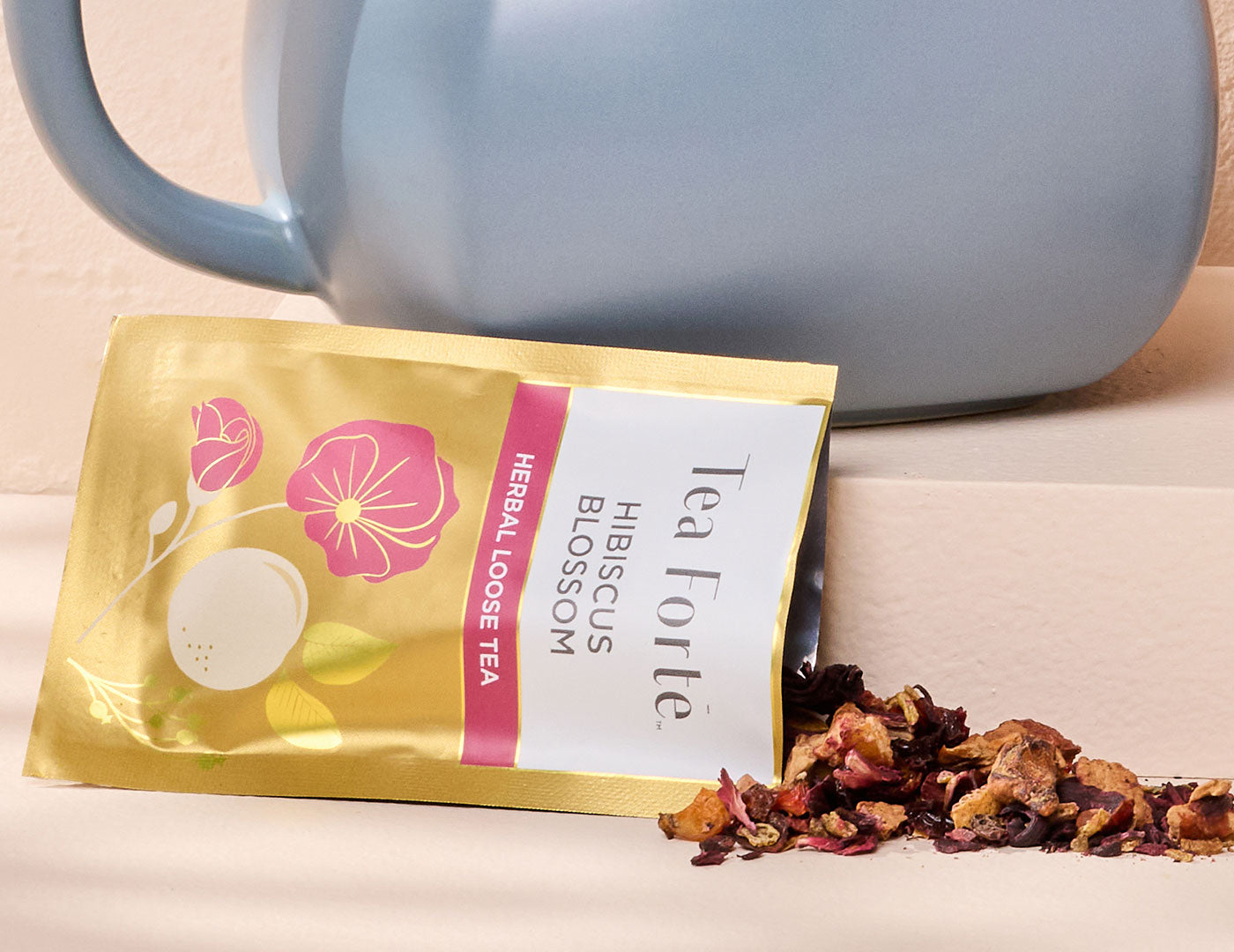 Single Steeps Herbal Single Steeps pouch opened with teapot in background