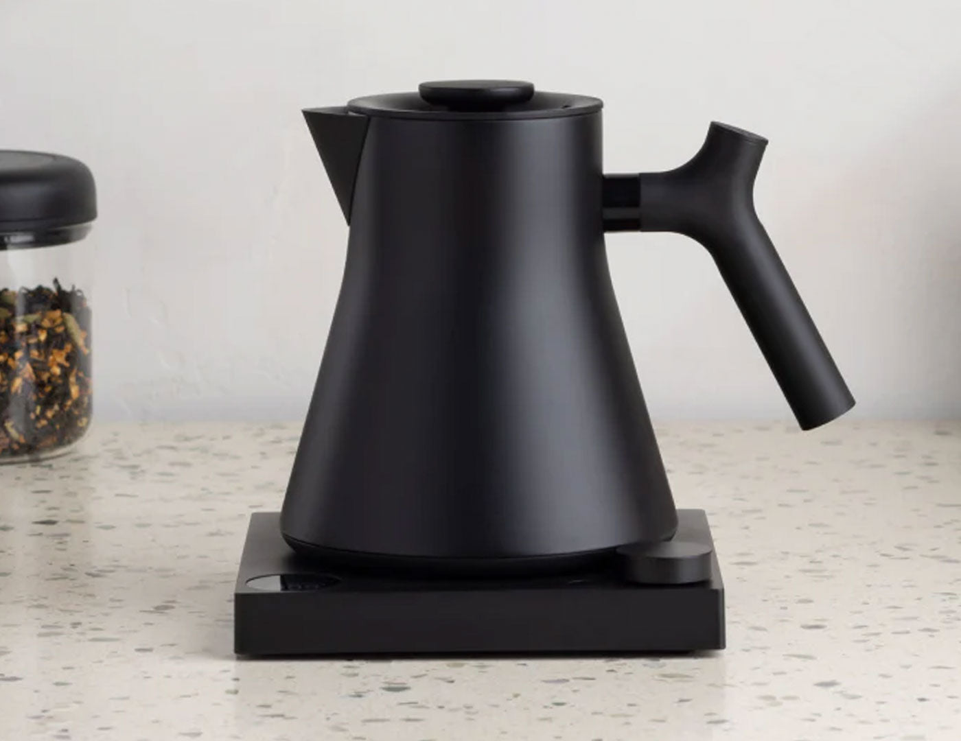 Black Corvo Kettle EKG Pro resting on it