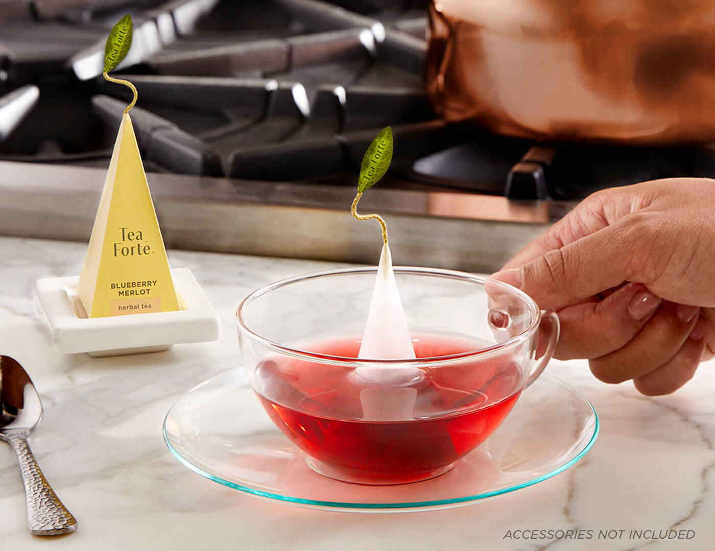 Blueberry Merlot pyramid tea infuser with glass cup in kitchen