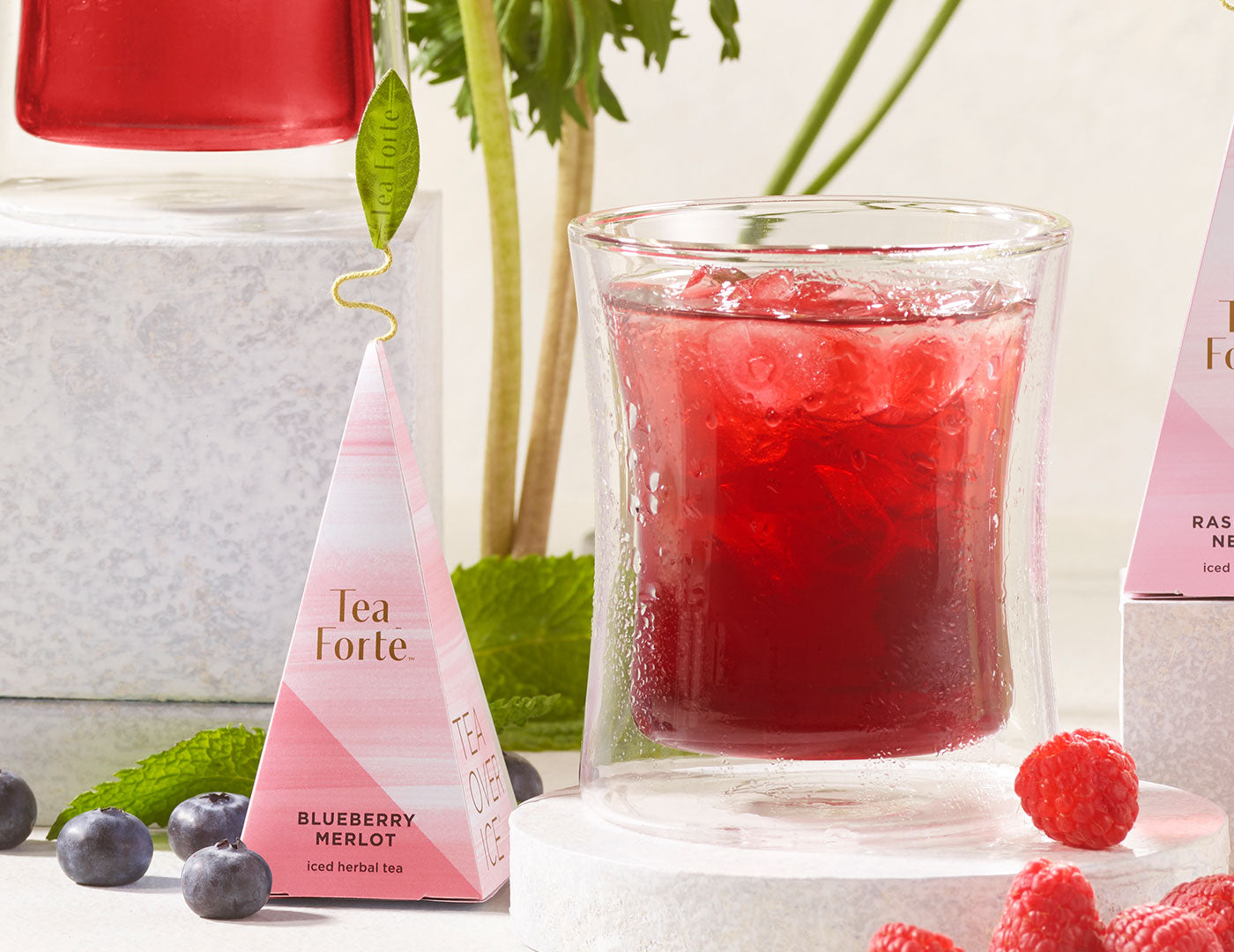 Blueberry Merlot Tea Over Ice in a POOM glass with infuser