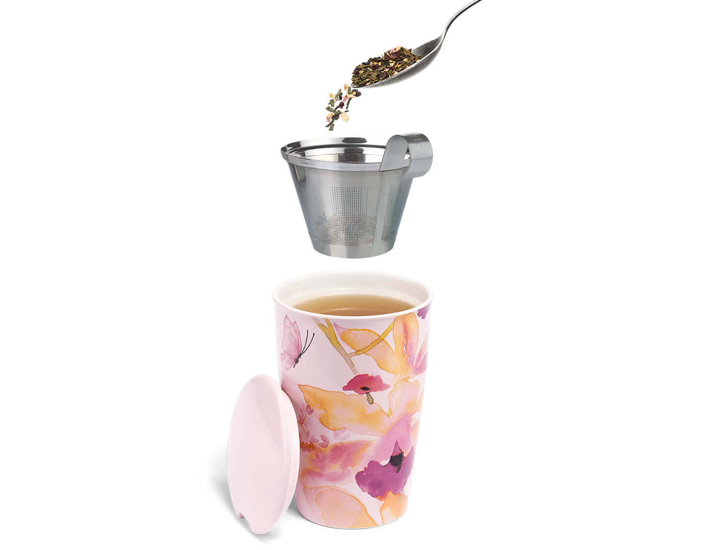 Spooning loose leaf tea into the Mariposa Kati Steeping Cup & Infuser 