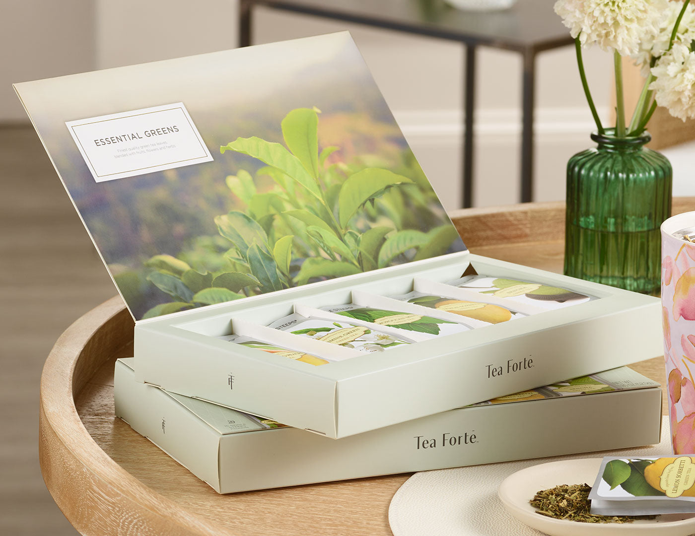 Essential Greens tea assortment 15 count box of Single Steeps pouches - open and stacked on another box
