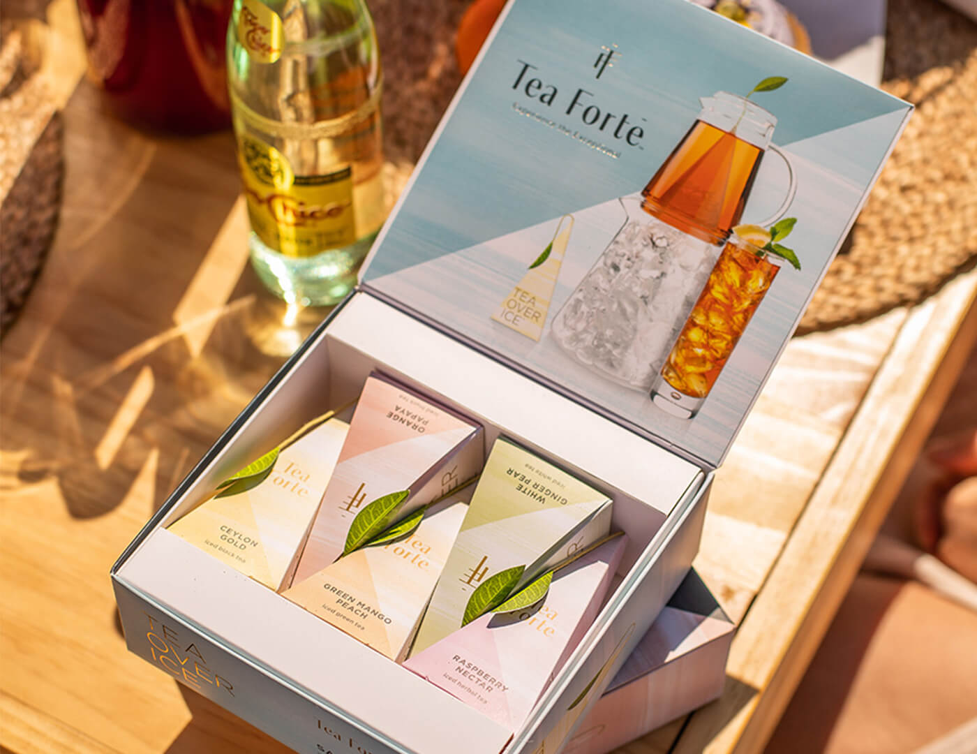 MAIN PDP | Tea Over Ice 5pk open on a wooden table