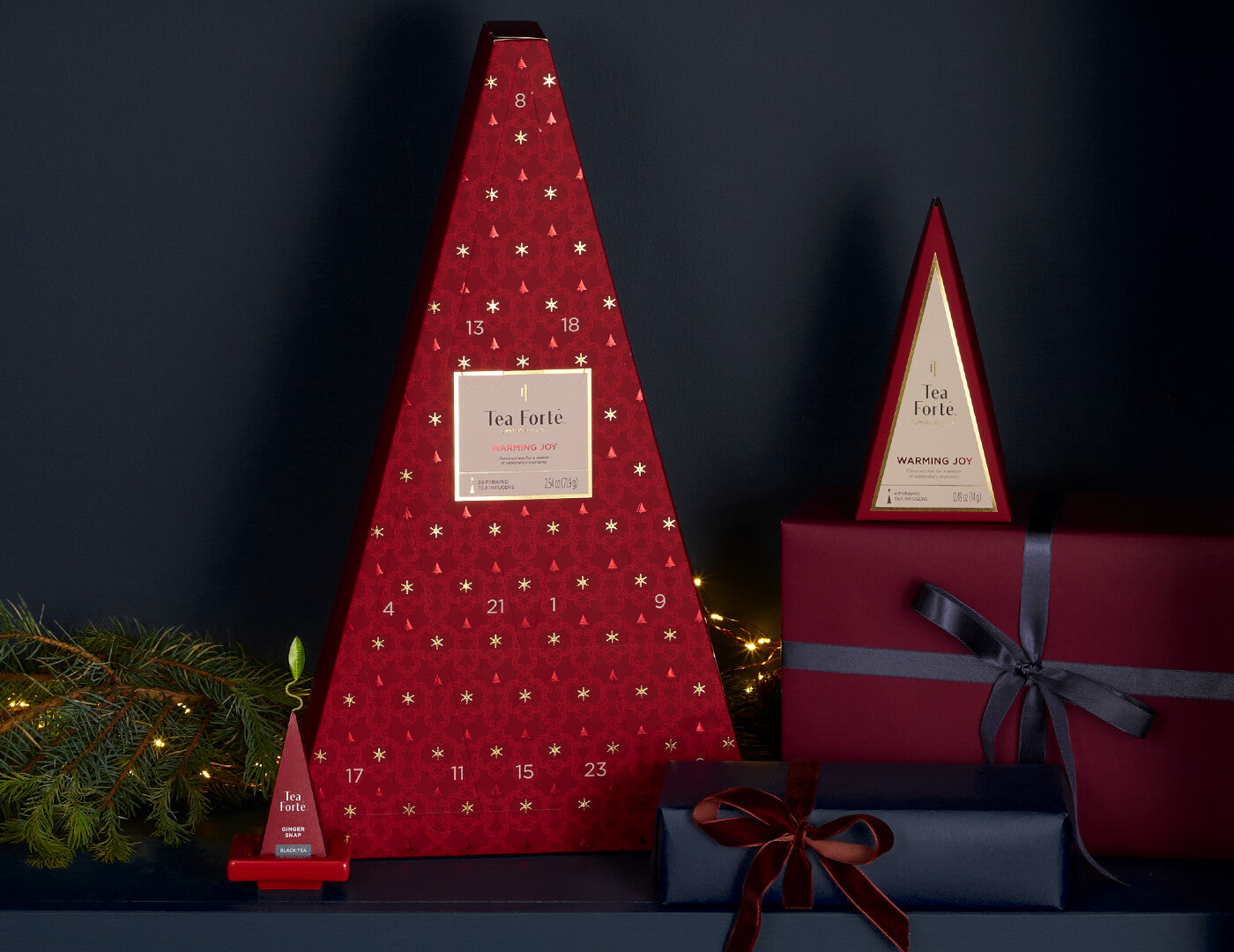 Warming Joy Advent Calendar with infuser and Petite Tea Tree on a shelf