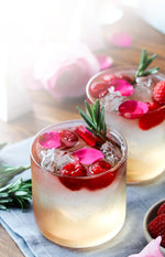 Tea Cocktail - Sparkling Love Affair with raspberries and rosemary