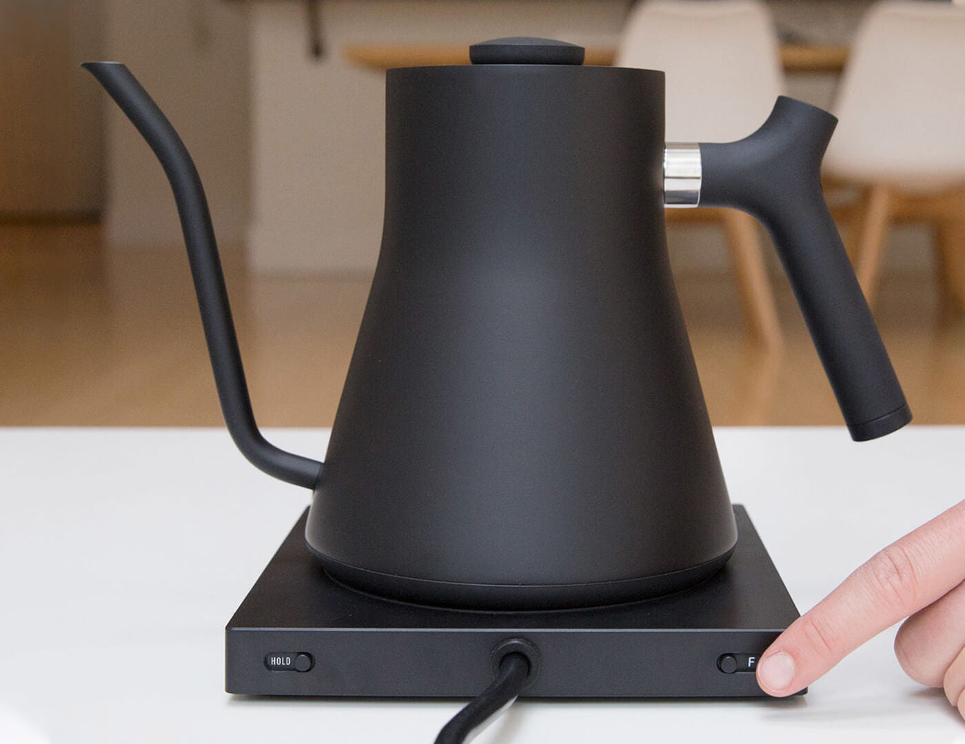 Stagg electric kettle in black showing temperature control