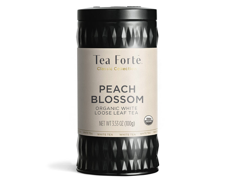 Peach Blossom tea in a canister of loose tea